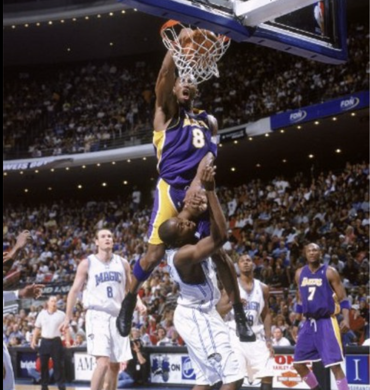 Player doing slam dunk